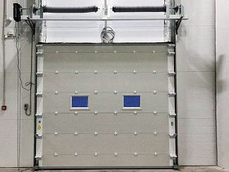 Секционные противопожарные ворота с окнами и люками  EI60